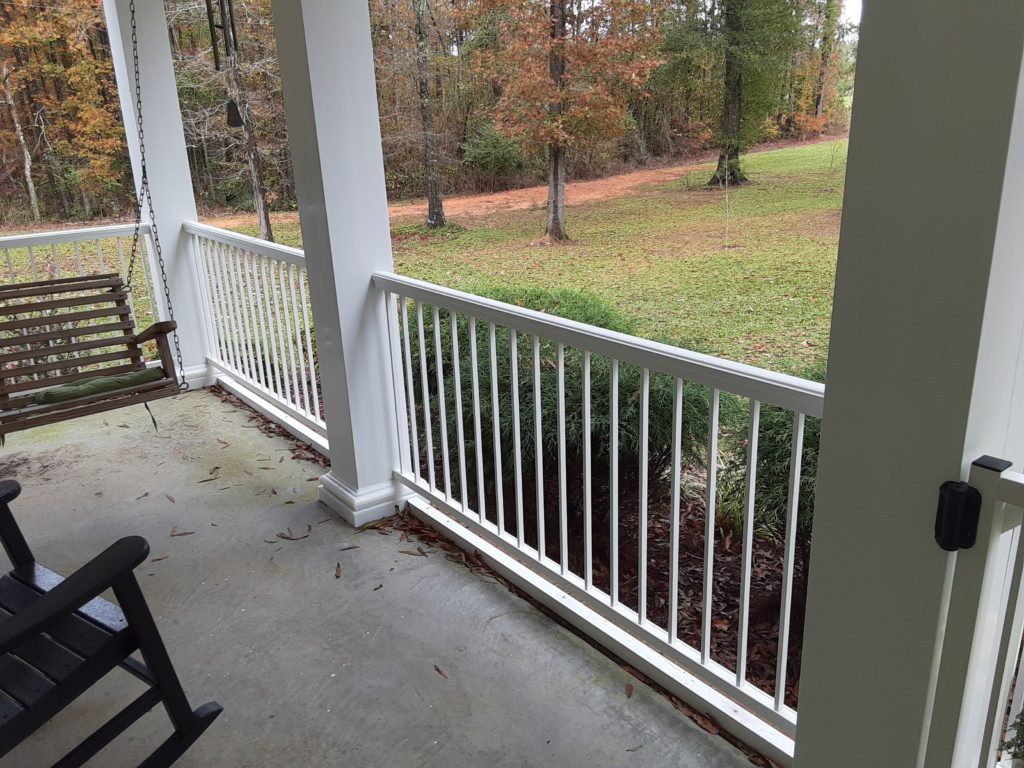 Completed front porch upgrades by Archadeck of Central GA